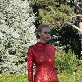 A model prepares to walk the runway in a typical sample gown. Photo credit: Alaina Brandenburger
