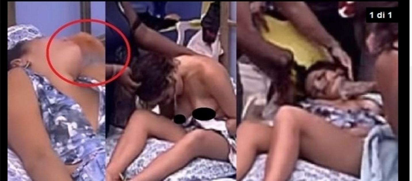 O marido bebe a vodka no tranquilo